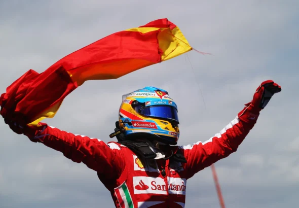 Fernando Alonso celebrando su última victoria en la Fórmula 1.